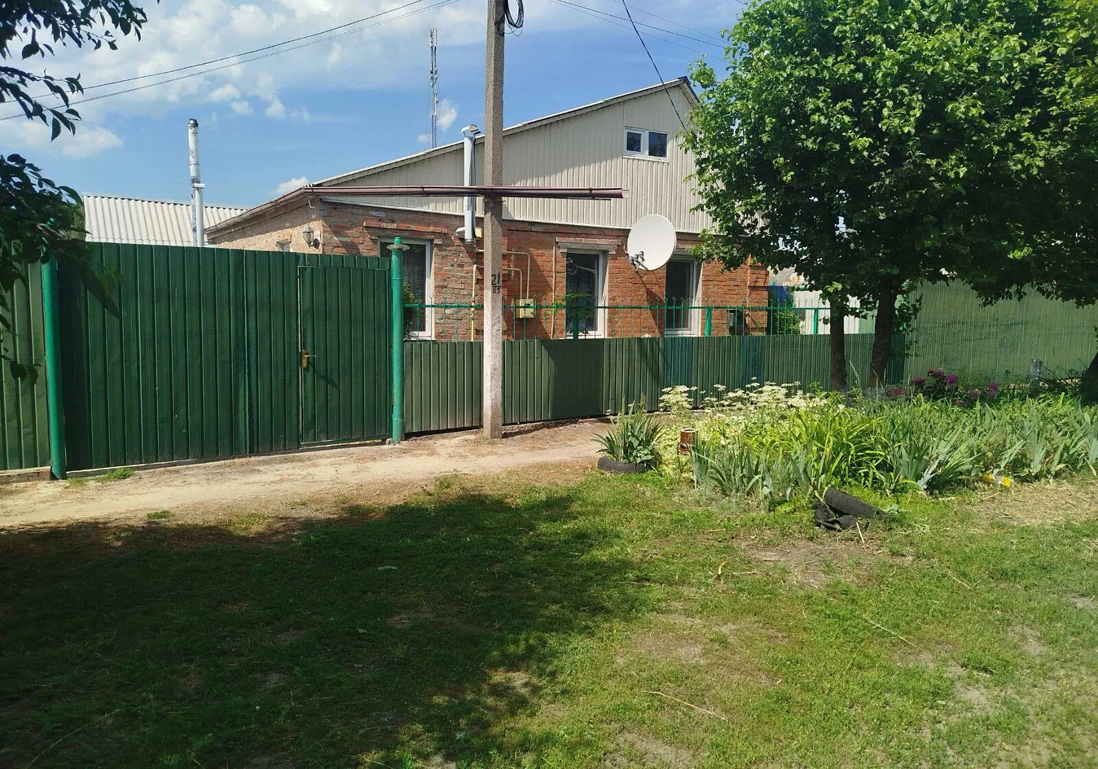 Будинок, Богодухів: твердопаливний котел, господарські будівлі