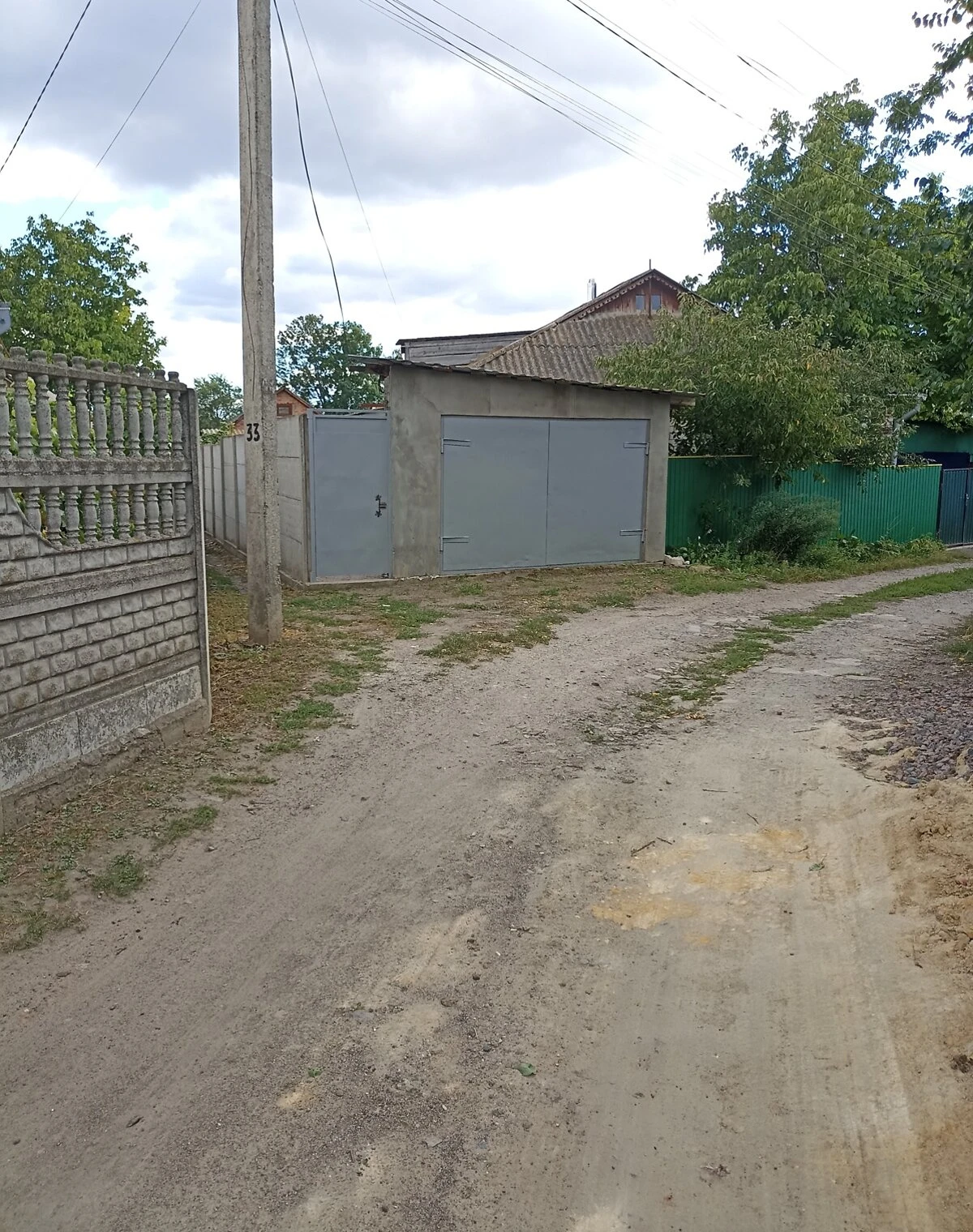 Частина будинку, Іллінці: гараж у прибудові, веранда, криниця